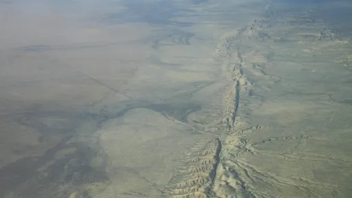 Aerial view from a plane of the Carrizo Plain region of the San Andreas Fault, with a visible fault trace.