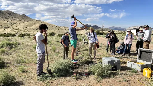 URISE intern Jackson Fellows in the field. 