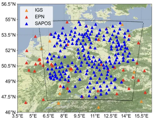 A map of northern Germany with colored triangles marking the locations of GNSS stations.