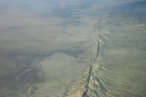 Aerial view from a plane of the Carrizo Plain region of the San Andreas Fault, with a visible fault trace.
