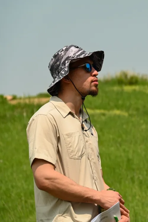 Nick Shepard observing in the field. 
