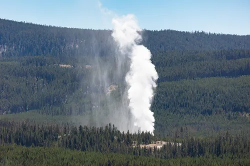 photo of steamboat geyser erupting high into the air